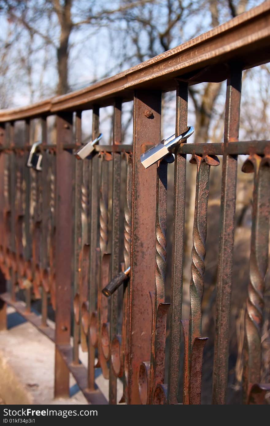 Padlocks of love on bridge