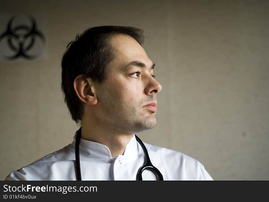 Male in medical gown and stetoscope. Male in medical gown and stetoscope