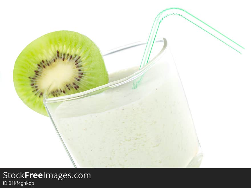 Close-up milkshake with kiwi and straw, isolated on white