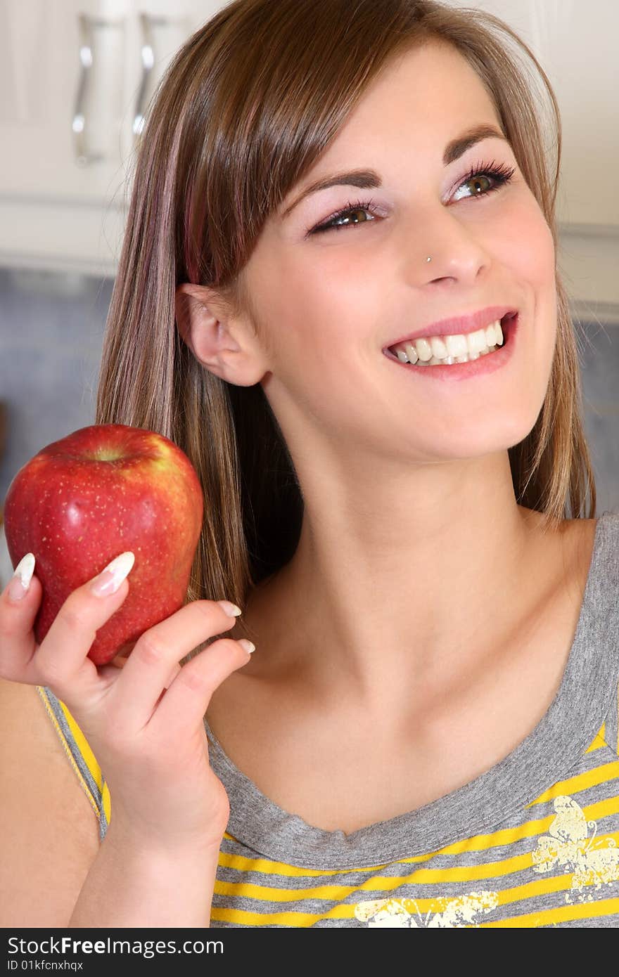 Young woman in her kitchen