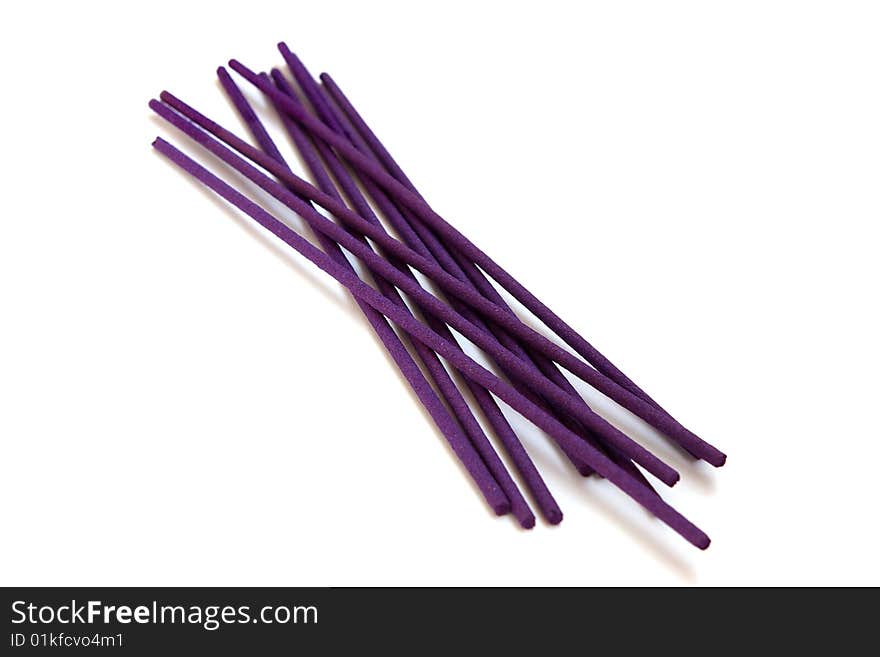 Violet lavender joss sticks isolated on a white background. Violet lavender joss sticks isolated on a white background