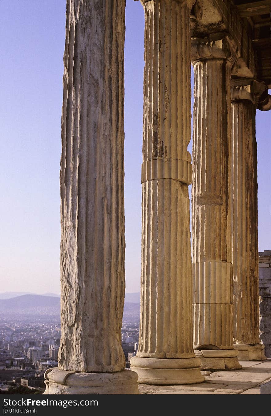 Old columns of Erechteion Temple on Acropolis hill in Athens, Greece. Old columns of Erechteion Temple on Acropolis hill in Athens, Greece.