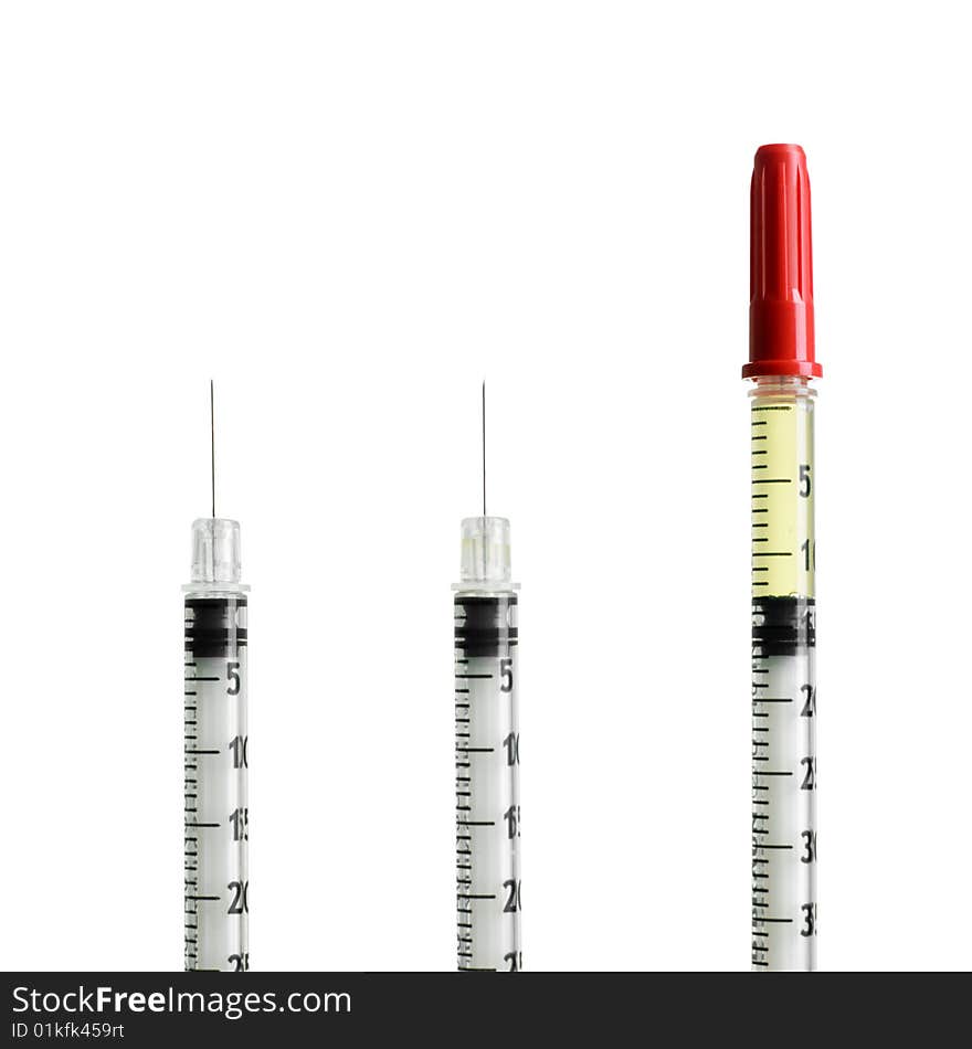 Three syringes isolated on white background