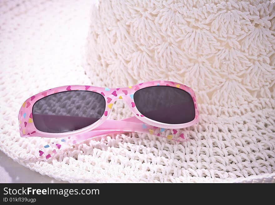 Hat with sunglasses, toned in pink. Hat with sunglasses, toned in pink