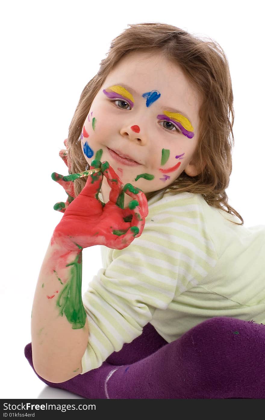 The gifted young artist. Close-up portrait of fanny girl with painted hands and face, isolated on white. The gifted young artist. Close-up portrait of fanny girl with painted hands and face, isolated on white