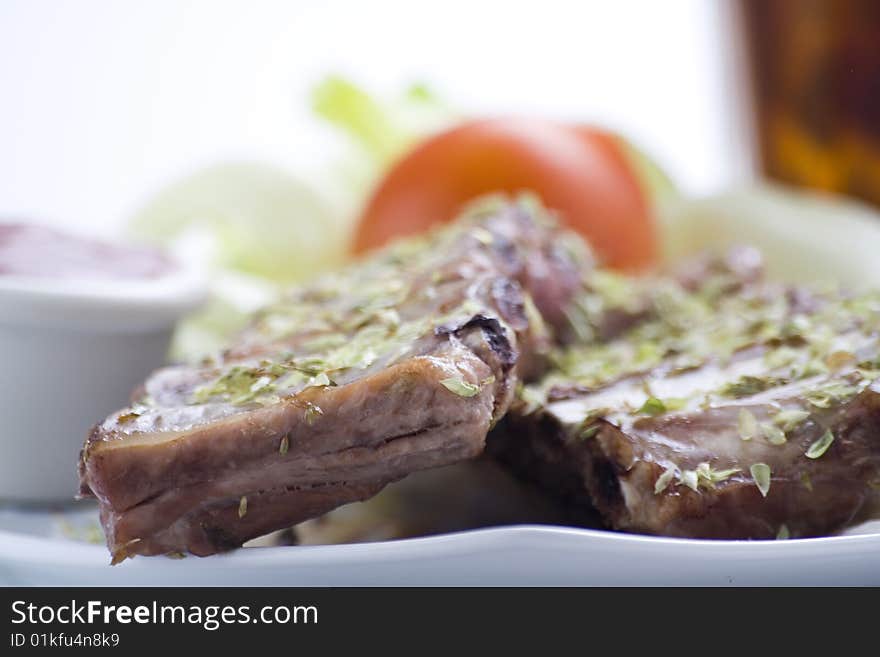 Fresh american ribs oregano bbq sausace isolated