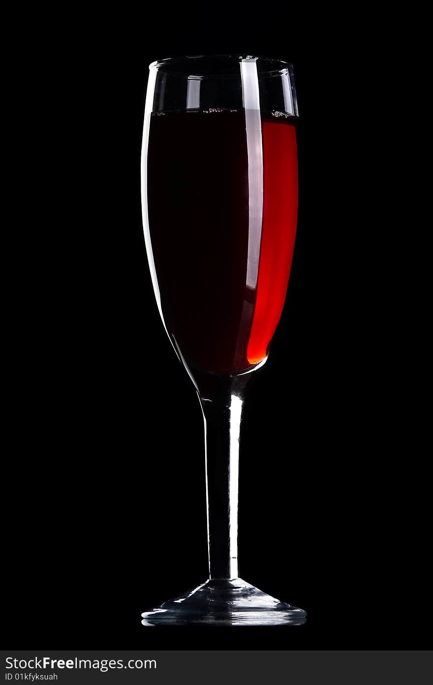 Wine glass isolated at black background