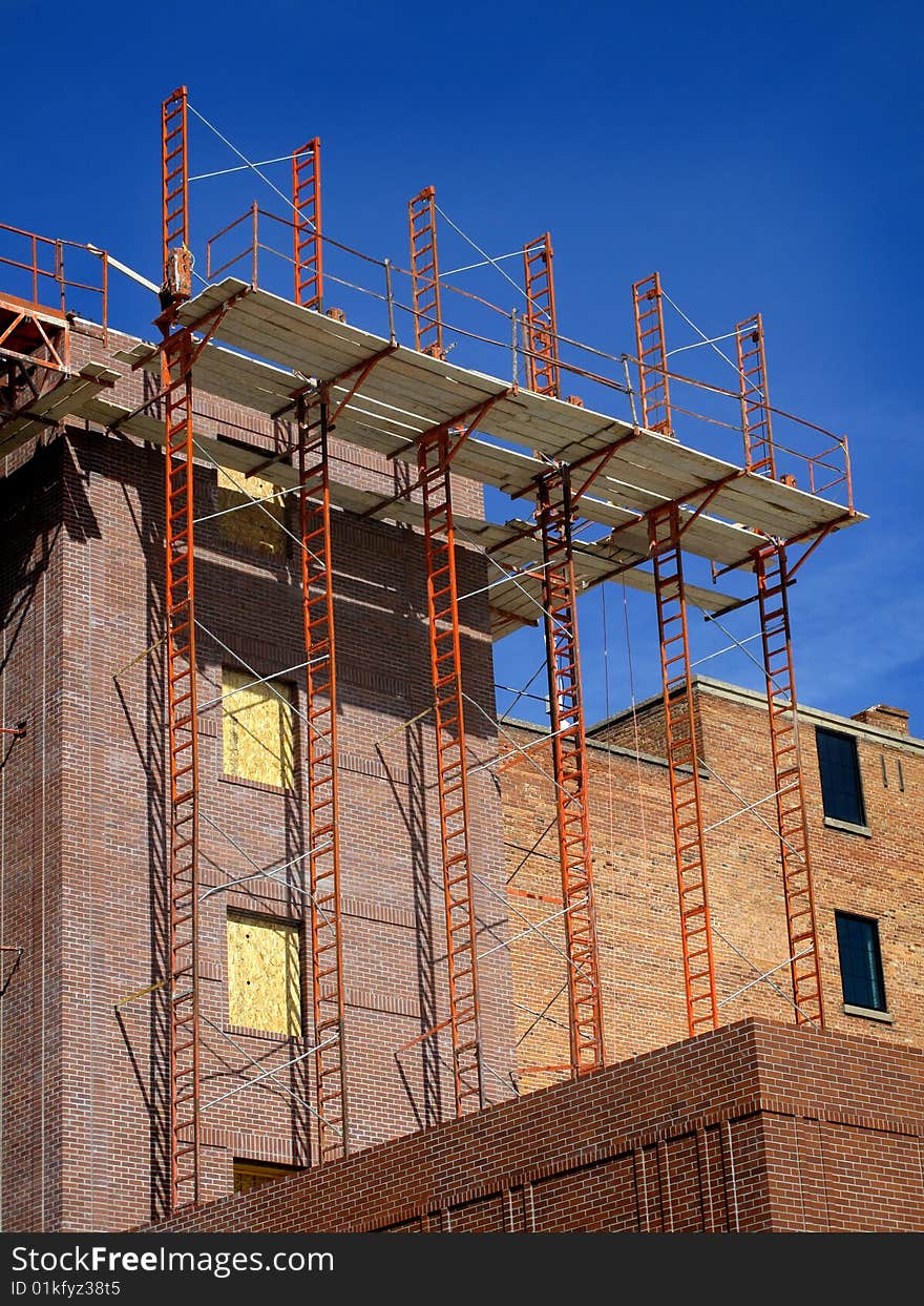 New building being built and detail of construction site. New building being built and detail of construction site