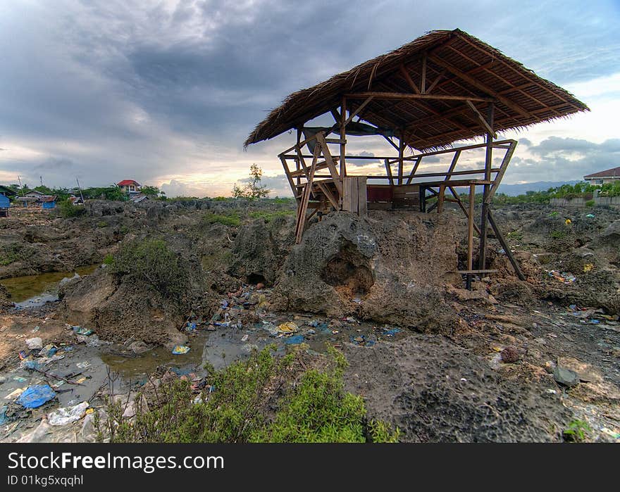 This simple shed is located in Barangay Babag, Lapu-lapu City, Cebu, Philippines. This HDR was taken during sunset. This simple shed is located in Barangay Babag, Lapu-lapu City, Cebu, Philippines. This HDR was taken during sunset.