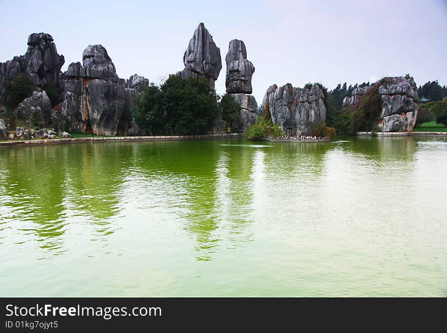 Stone forest around the river scene