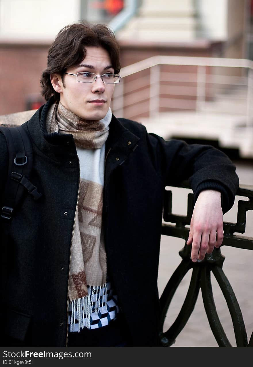 Pretty smiling young man outdoor. Pretty smiling young man outdoor