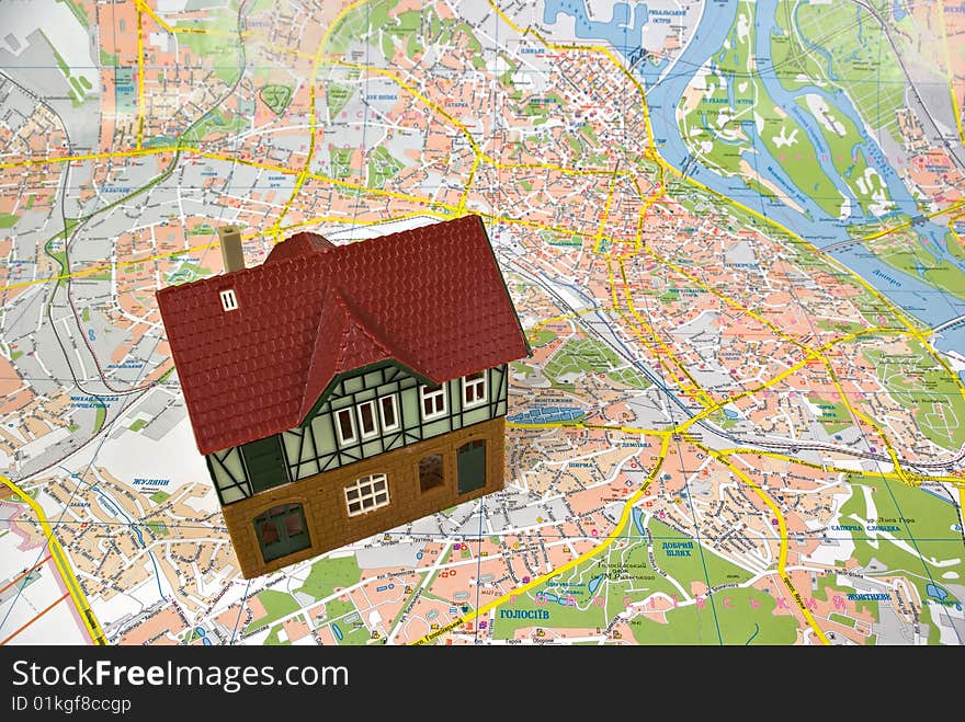 Model of a detached house on a city map. Model of a detached house on a city map