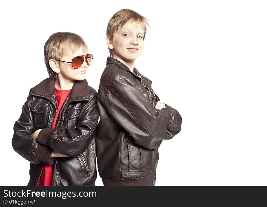 Isolated brothers posing over white background