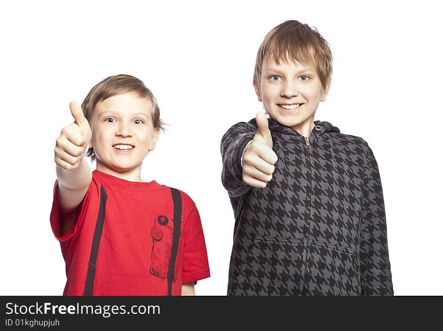 Isolated brothers posing over white background. Isolated brothers posing over white background