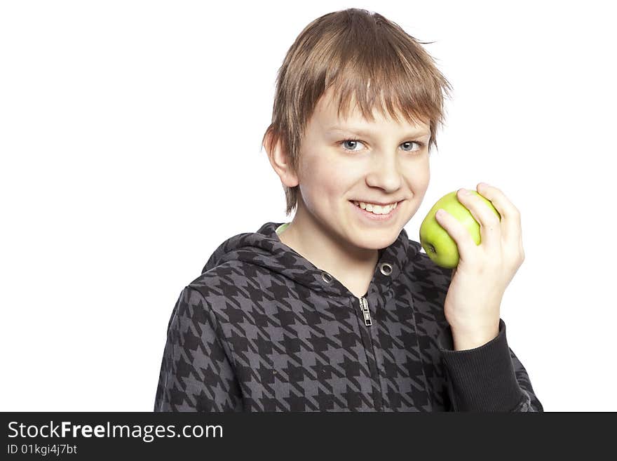 Isolated boy eating apple over white background. Isolated boy eating apple over white background