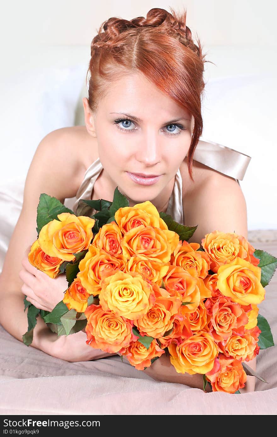 Beautiful young woman with bunch of roses. Beautiful young woman with bunch of roses