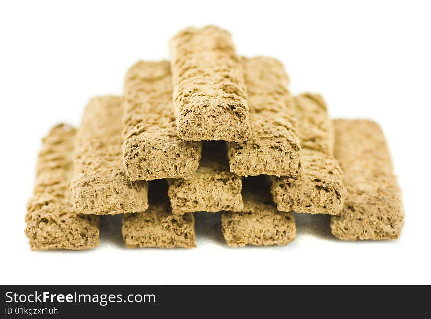 Pyramid of bran biscuit isolated on white background. Pyramid of bran biscuit isolated on white background