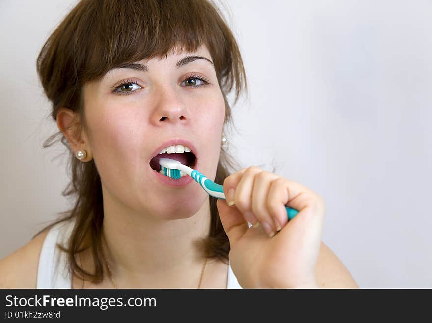 Young Woman Cleaning Teeth