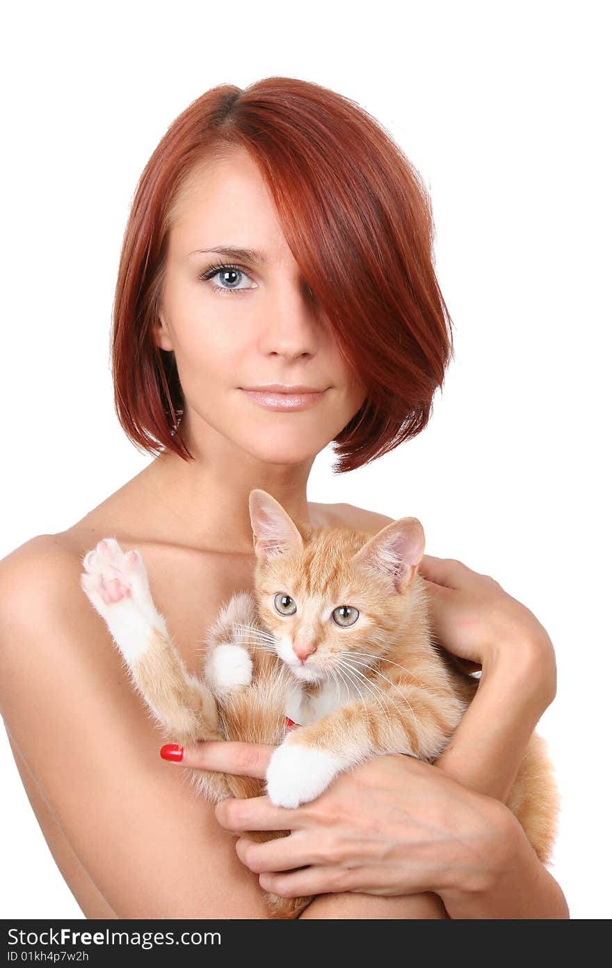 Beautiful redhead girl with red fluffy kitten. Beautiful redhead girl with red fluffy kitten