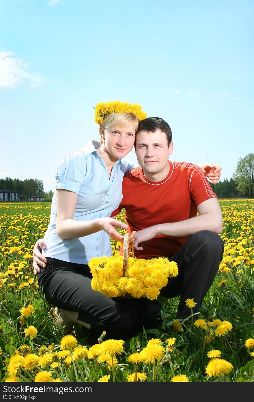 Happy young couple relaxing outdoors. Happy young couple relaxing outdoors