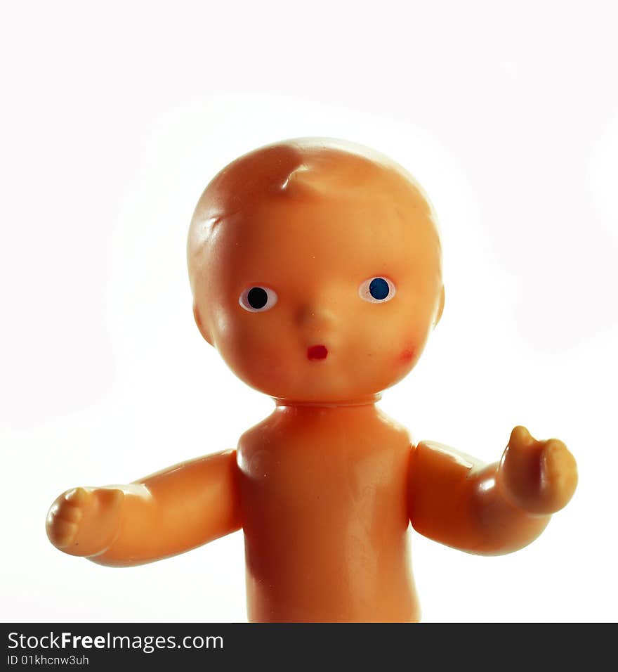 Portrait Of Plastic Baby Isolated On White