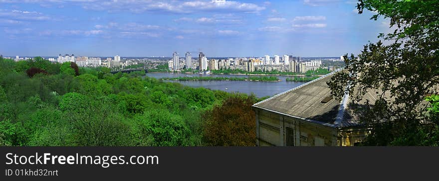 Nice horizontal panorama of the european city with river. Nice horizontal panorama of the european city with river