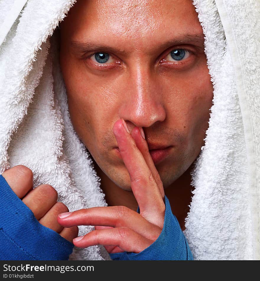 Portrait of the beautiful charismatic man with blue eyes. Portrait of the beautiful charismatic man with blue eyes