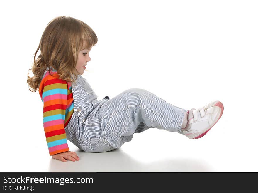 Beauty a little girl crawled on white background