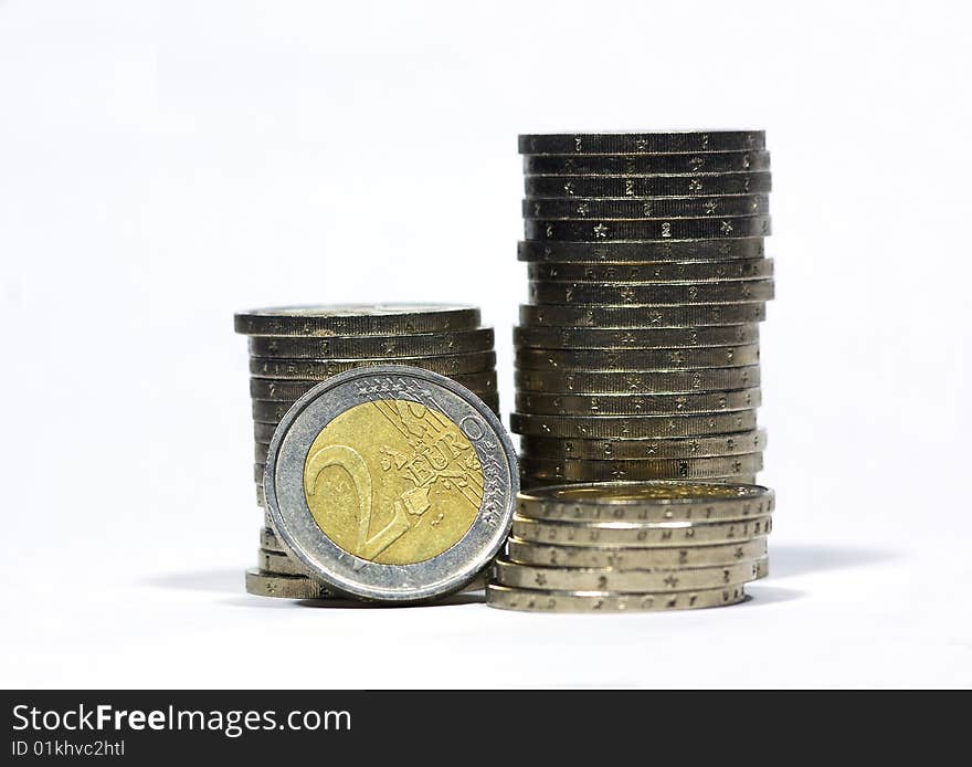 Euro coins superimposed on a white background