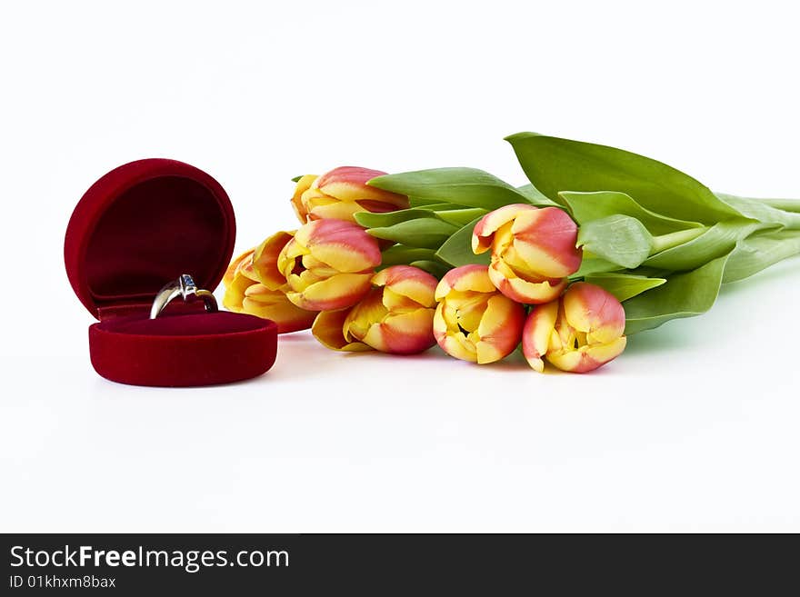 Bunch of flowers and box with ring. File include clipping path. Bunch of flowers and box with ring. File include clipping path