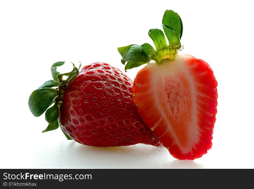 Two strawberries on a white background. Two strawberries on a white background