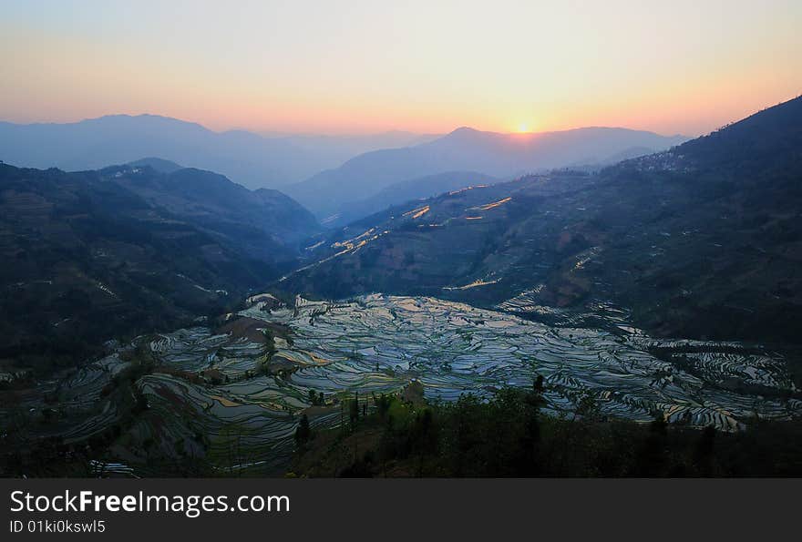 Yuanyang County is a county of YunNan province, China. It is home to the most spectacular terraced rice fields in the world. The fields have been cultivated by Hani minority people for centuries and constitute a unique self-sustaining ecosystem. The rice field can be found from 800m - 2000m above sea level, and farmers generally lives on top of the hill and go down every day for their far work. Yuanyang County is a county of YunNan province, China. It is home to the most spectacular terraced rice fields in the world. The fields have been cultivated by Hani minority people for centuries and constitute a unique self-sustaining ecosystem. The rice field can be found from 800m - 2000m above sea level, and farmers generally lives on top of the hill and go down every day for their far work.