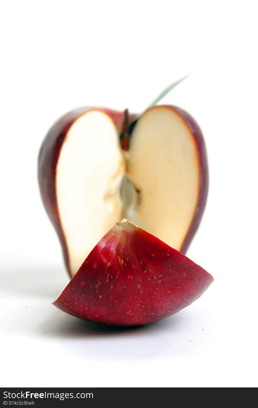 Close up of cross red apple on white background. Close up of cross red apple on white background