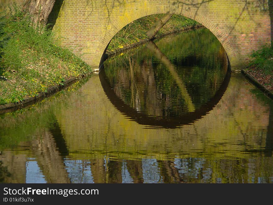 This is a detail of a bridge reflected on the water. This photo was shot in Utrech (Holland). This is a detail of a bridge reflected on the water. This photo was shot in Utrech (Holland)