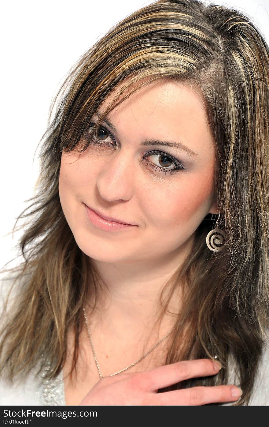 Studio Shot of a brunette woman with big brown eyes, isolated on white background. Studio Shot of a brunette woman with big brown eyes, isolated on white background