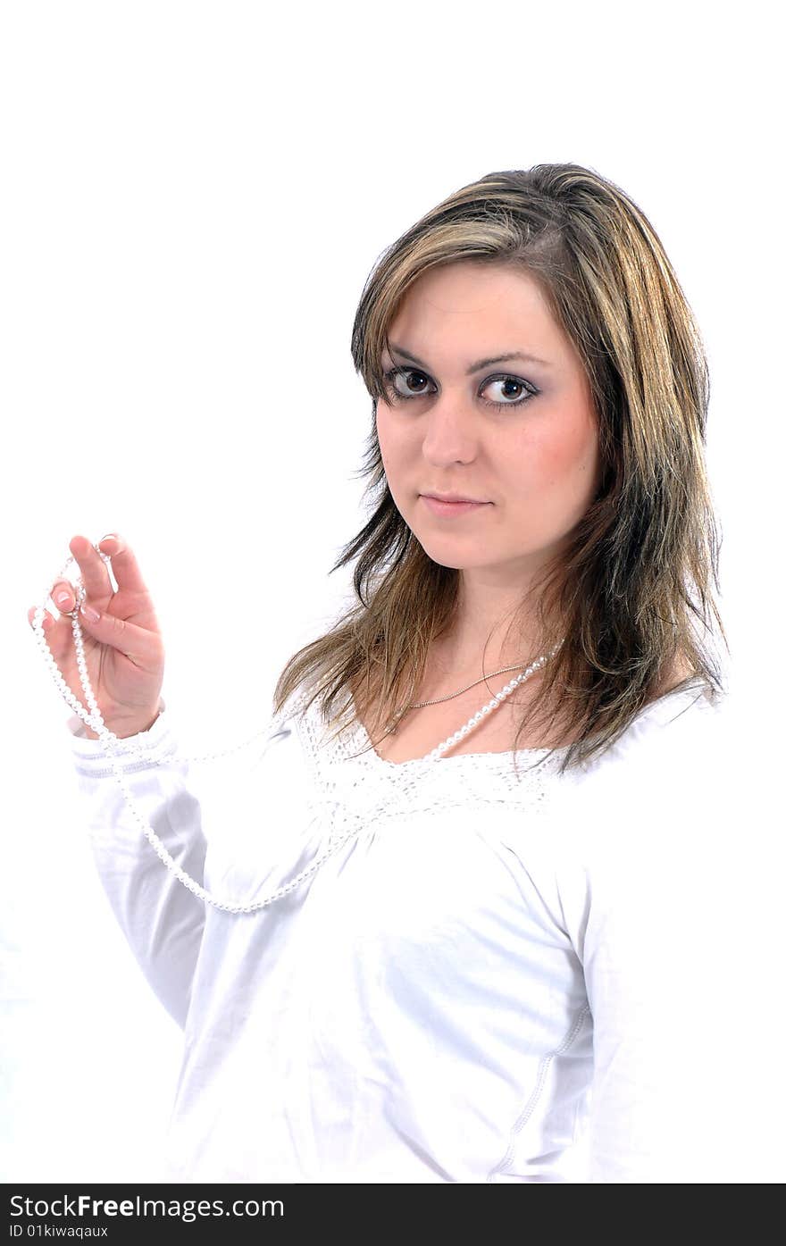 Studio Shot of a brunette woman with big brown eyes, isolated on white background. Studio Shot of a brunette woman with big brown eyes, isolated on white background