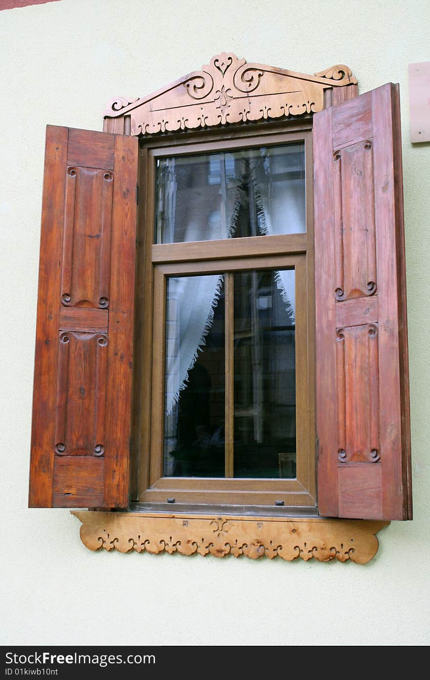 Carved wooden window