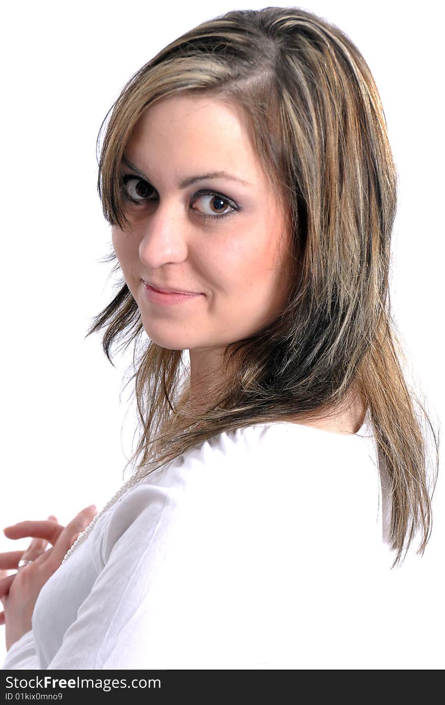 Studio Shot of a brunette woman with big brown eyes, isolated on white background. Studio Shot of a brunette woman with big brown eyes, isolated on white background