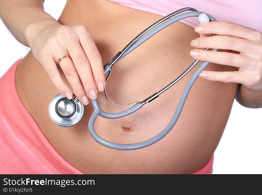 Pregnant woman isolated on a white background