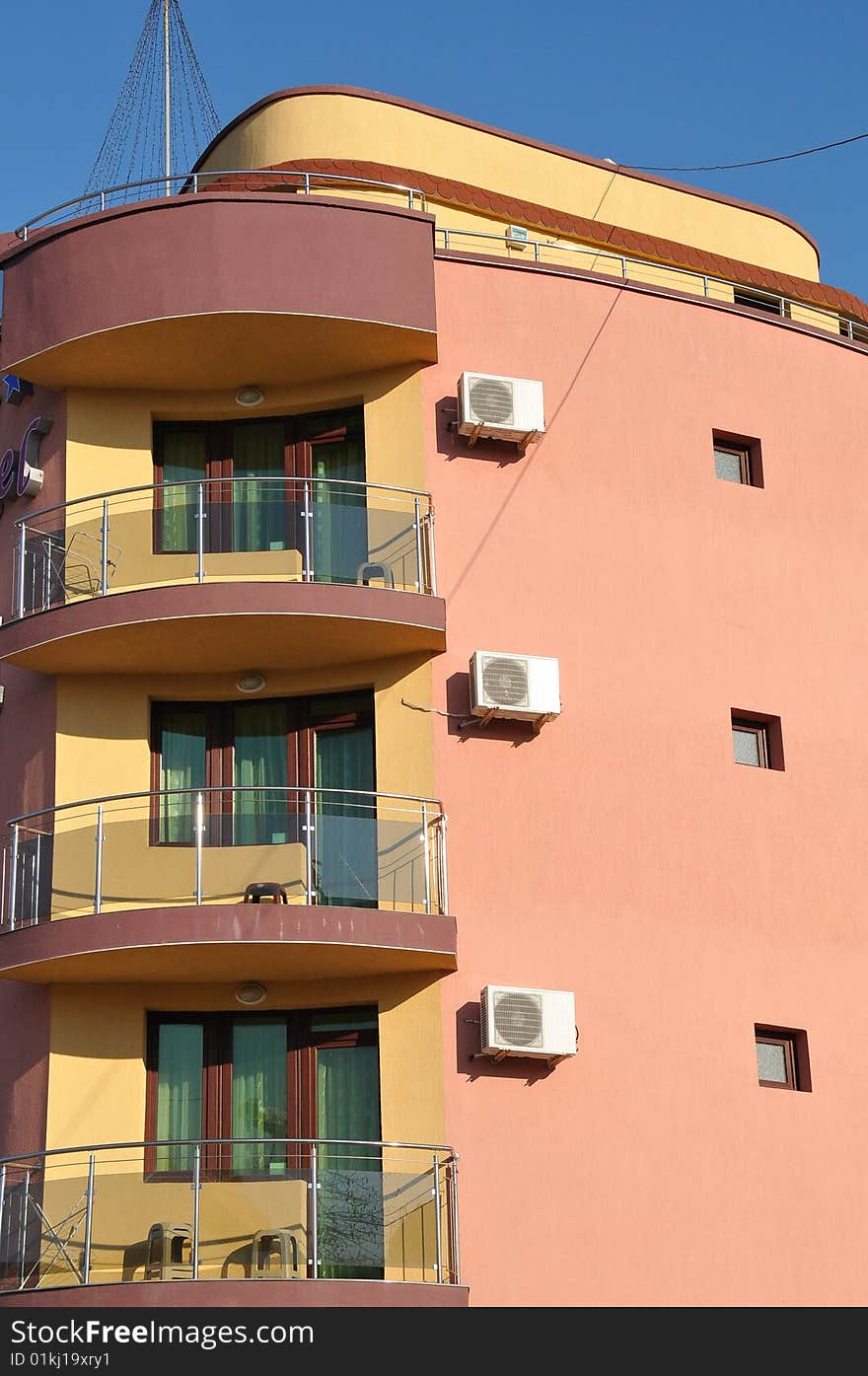 View of the colorful facade of a hotel. View of the colorful facade of a hotel