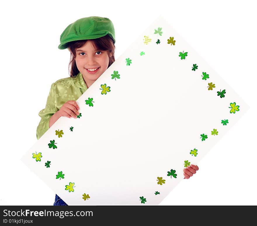 An elementary girl dressed in green holding a shamrok-bordered sign, left blank for your message.  Isolated on white. An elementary girl dressed in green holding a shamrok-bordered sign, left blank for your message.  Isolated on white.