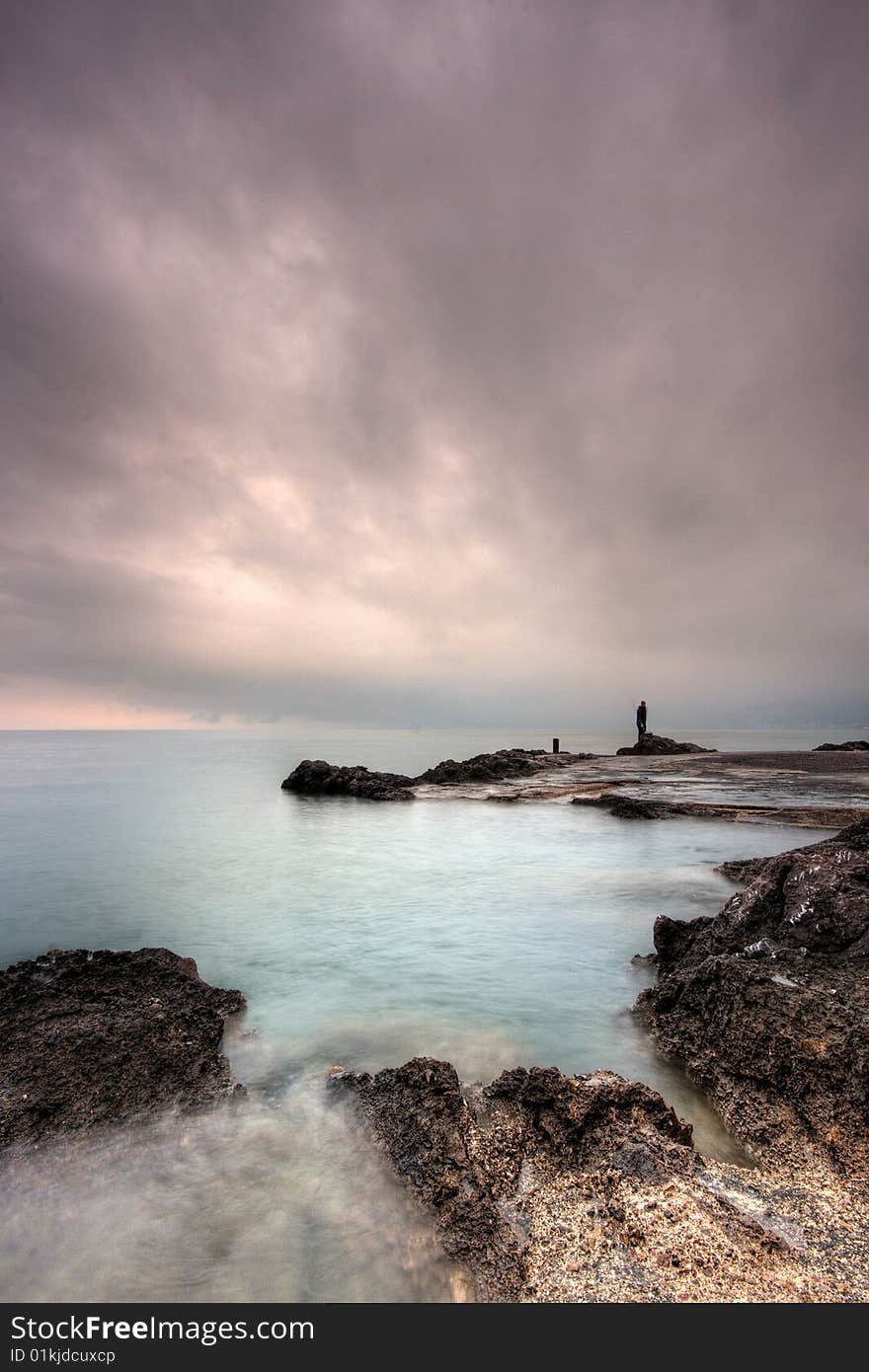 One cloudy dan by the sea