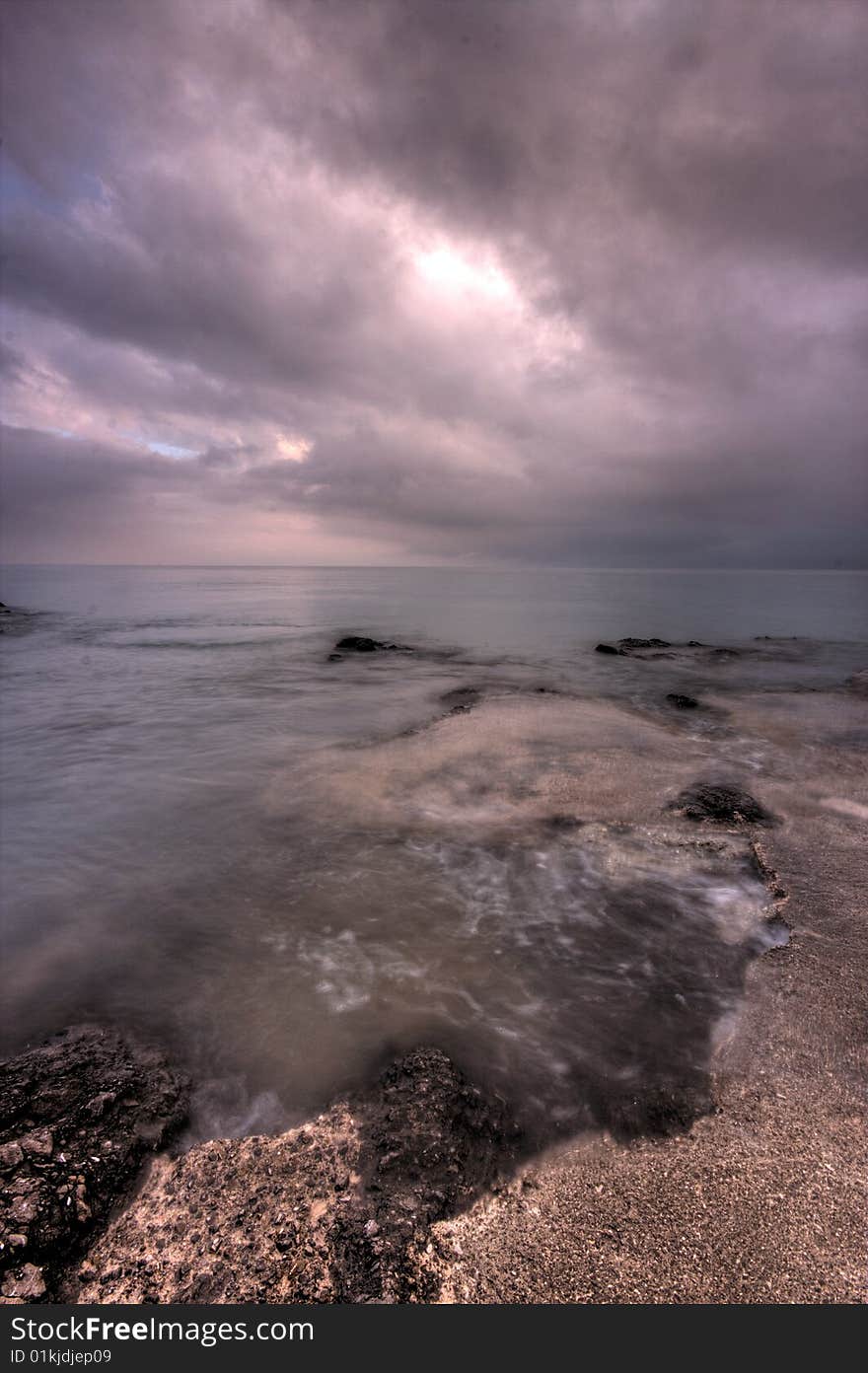 One cloudy dan by the sea