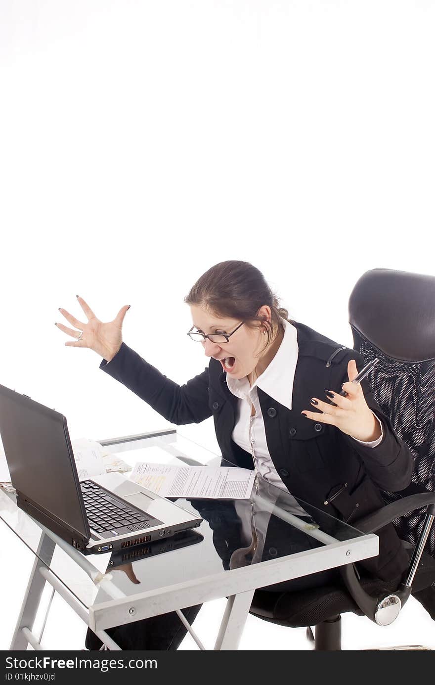 A young, very frustrated woman, in her office, isolated on white. A young, very frustrated woman, in her office, isolated on white