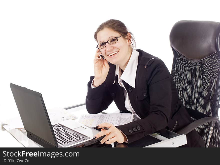 A young woman workin in her office, isolated on white. A young woman workin in her office, isolated on white