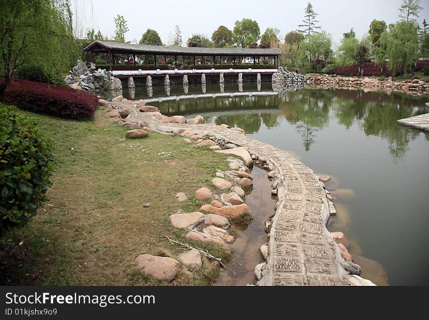 Lake with pavilion in park,anhui china