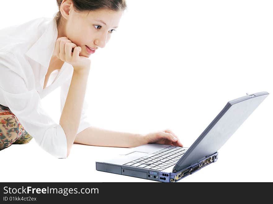 Cute young woman with laptop on the white. Cute young woman with laptop on the white