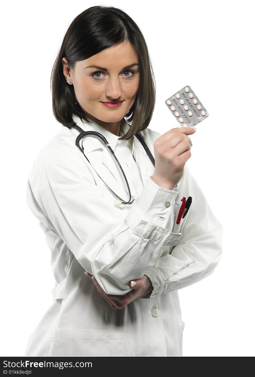 Female doctor handing medicine isolated on white