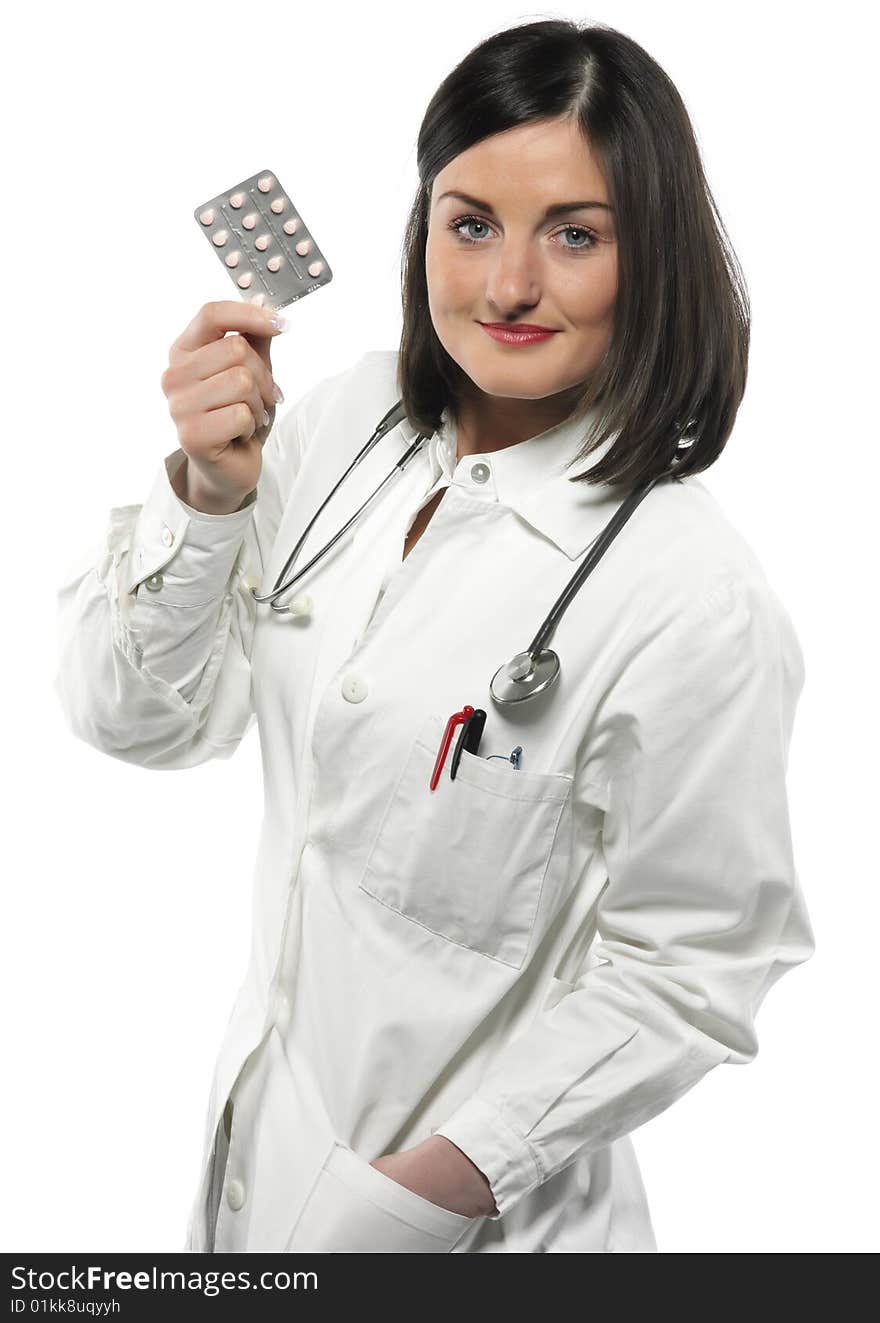 Female doctor handing medicine isolated on white