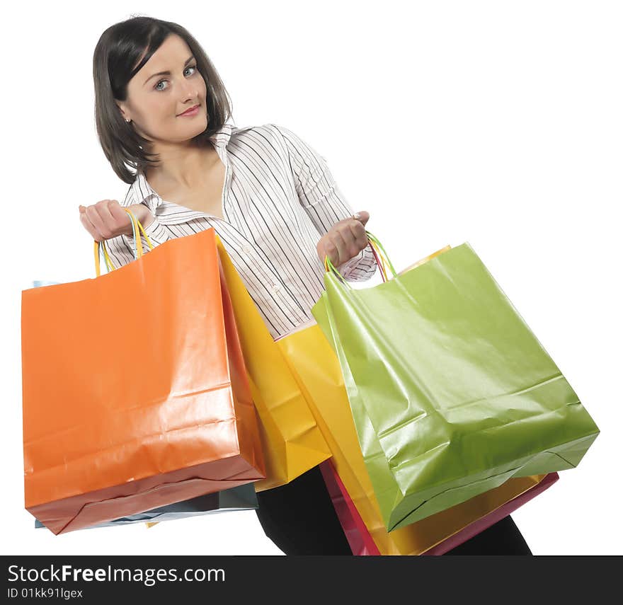 Young adult girl with colored bags